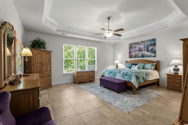 2318 Via Palma Dr, North Myrtle Beach, SC 29582 - bedroom with a raised ceiling, baseboards, light tile patterned flooring, and ornamental molding