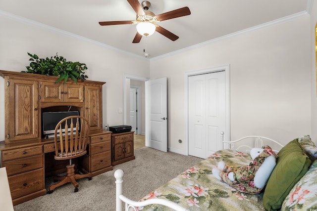 2318 Via Palma Dr, North Myrtle Beach, SC 29582 - bedroom with light colored carpet, ornamental molding, a closet, ceiling fan, and an office area