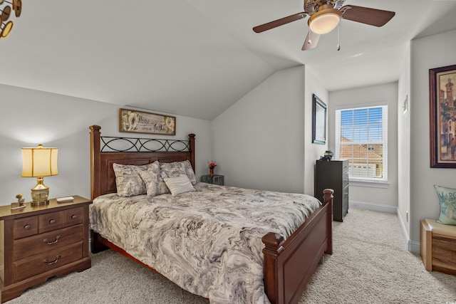 2318 Via Palma Dr, North Myrtle Beach, SC 29582 - bedroom featuring light colored carpet, vaulted ceiling, ceiling fan, and baseboards