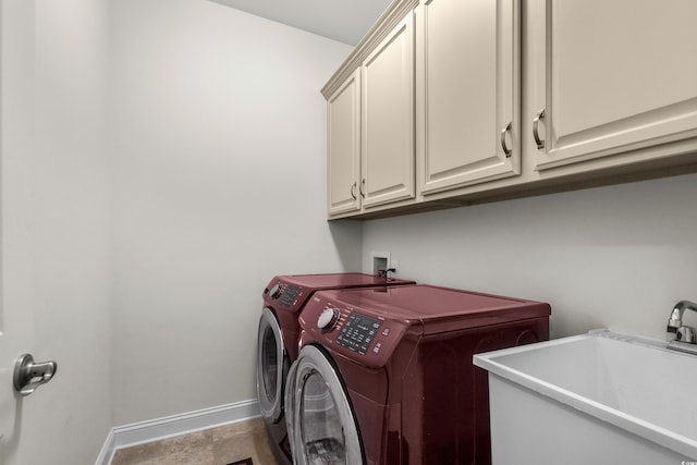 2318 Via Palma Dr, North Myrtle Beach, SC 29582 - laundry room with washing machine and dryer, cabinet space, and baseboards