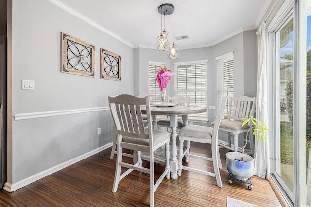 7007 Blade Beak Ln, Myrtle Beach, SC 29588 - dining room with wood finished floors, ornamental molding, and baseboards