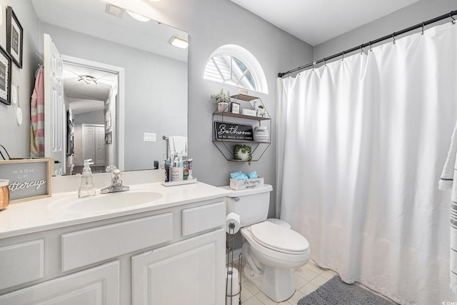7007 Blade Beak Ln, Myrtle Beach, SC 29588 - full bathroom featuring tile patterned floors, toilet, vanity, and a shower with shower curtain