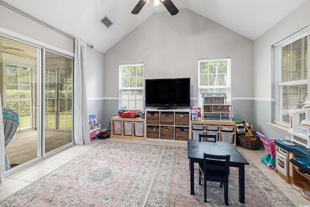7007 Blade Beak Ln, Myrtle Beach, SC 29588 - tiled living room with ceiling fan, plenty of natural light, and high vaulted ceiling