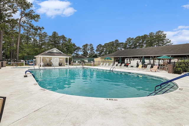 7007 Blade Beak Ln, Myrtle Beach, SC 29588 - community pool with a patio