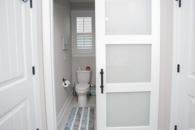 383 Mikita Dr, Surfside Beach, SC 29575 - bathroom with tile patterned flooring, toilet, and baseboards