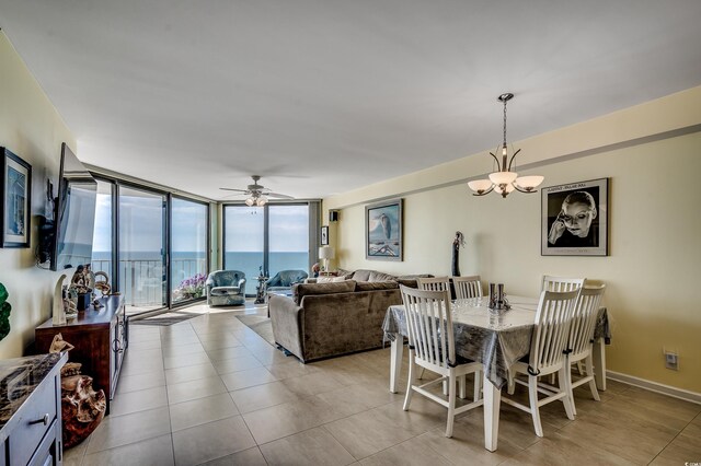 1990 N Waccamaw Dr Unit 1008, Murrells Inlet, SC 29576 - tiled dining room featuring expansive windows, a chandelier, and ceiling fan