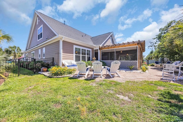 1145 Captain Hooks Way N, Myrtle Beach, SC 29582 - rear view of property featuring a sunroom, a fenced backyard, a patio, and roof with shingles