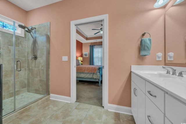 1145 Captain Hooks Way N, Myrtle Beach, SC 29582 - ensuite bathroom featuring vanity, a stall shower, a ceiling fan, and tile patterned floors