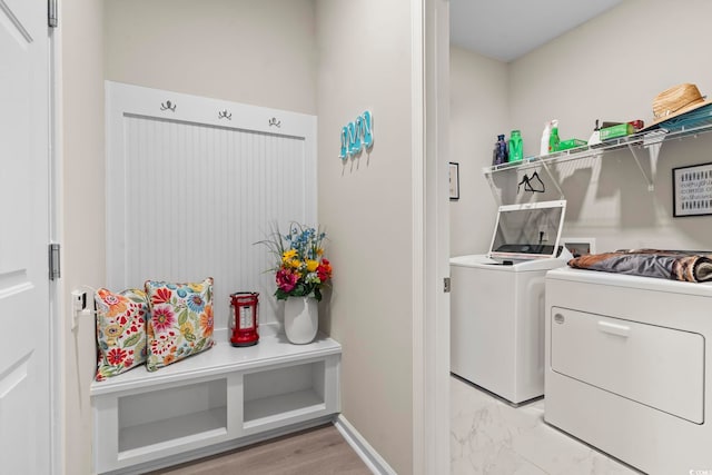 2572 Brescia St, Myrtle Beach, SC 29579 - washroom featuring washer and dryer, light marble finish flooring, and baseboards
