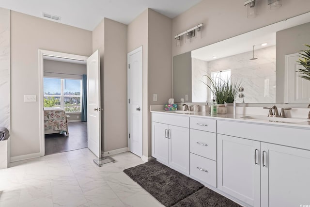 2572 Brescia St, Myrtle Beach, SC 29579 - bathroom with double vanity, baseboards, marble finish flooring, ensuite bath, and a shower