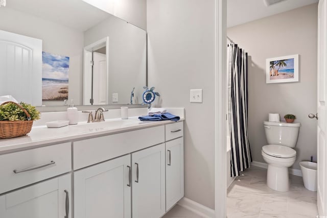 2572 Brescia St, Myrtle Beach, SC 29579 - bathroom featuring marble look tiles, vanity, toilet, and baseboards