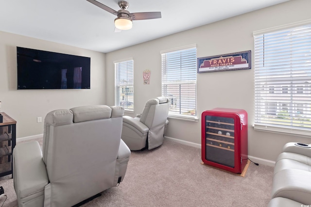 2572 Brescia St, Myrtle Beach, SC 29579 - living room featuring ceiling fan, baseboards, carpet flooring, and wine cooler