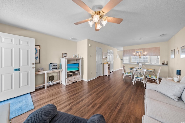 613 S 2nd Ave Unit 21D, North Myrtle Beach, SC 29582 - living room featuring a chandelier, wood finished floors, a textured ceiling, a ceiling fan, and baseboards