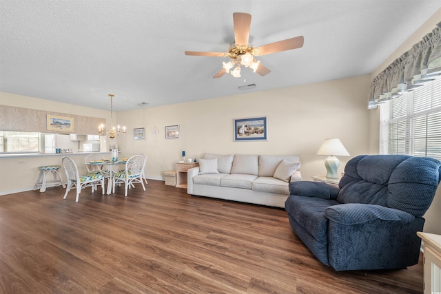 613 S 2nd Ave Unit 21D, North Myrtle Beach, SC 29582 - living room with a chandelier, wood finished floors, ceiling fan, and baseboards