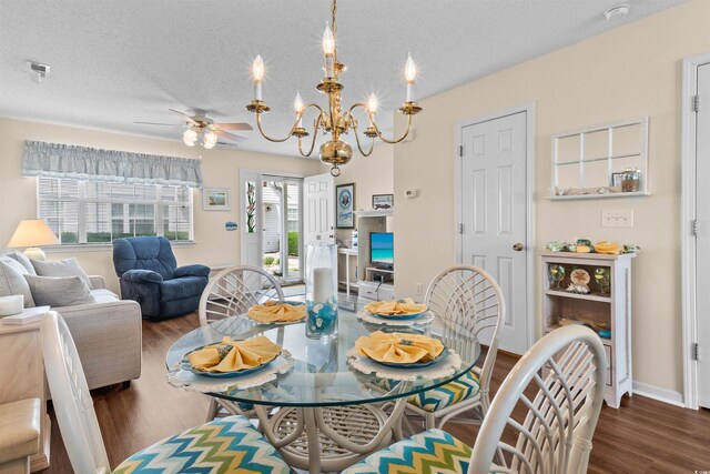 613 S 2nd Ave Unit 21D, North Myrtle Beach, SC 29582 - dining space featuring wood finished floors, healthy amount of natural light, a ceiling fan, a chandelier, and a textured ceiling