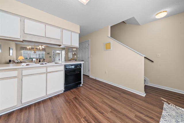 613 S 2nd Ave Unit 21D, North Myrtle Beach, SC 29582 - kitchen with black dishwasher, a sink, dark wood-type flooring, and a chandelier