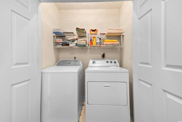 613 S 2nd Ave Unit 21D, North Myrtle Beach, SC 29582 - laundry area with washer and clothes dryer