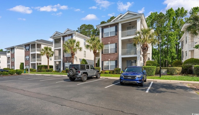 1298 River Oaks Dr Unit 5-I, Myrtle Beach, SC 29579 - view of building exterior with uncovered parking