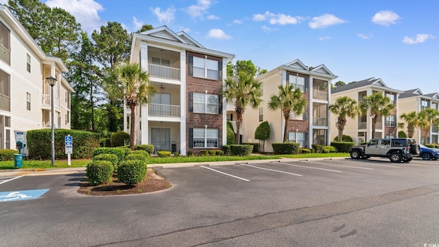 1298 River Oaks Dr Unit 5-I, Myrtle Beach, SC 29579 - view of building exterior featuring uncovered parking
