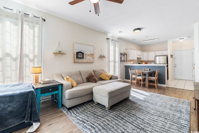 1298 River Oaks Dr Unit 5-I, Myrtle Beach, SC 29579 - living room with a ceiling fan and light wood-style flooring