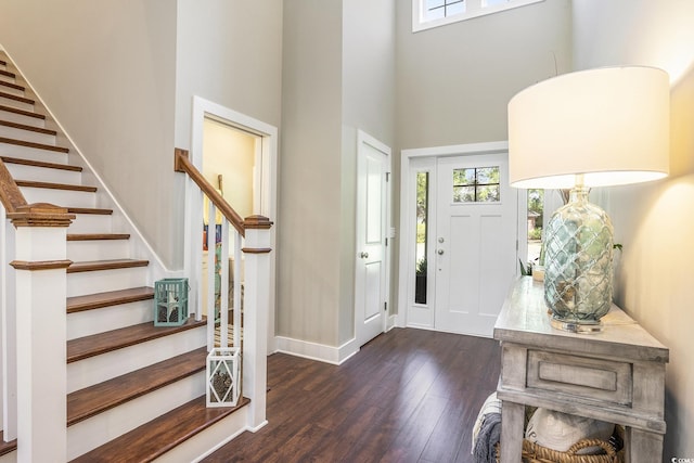 769 Country Club Dr, Pawleys Island, SC 29585 - entrance foyer featuring healthy amount of natural light, wood-type flooring, a high ceiling, and stairs
