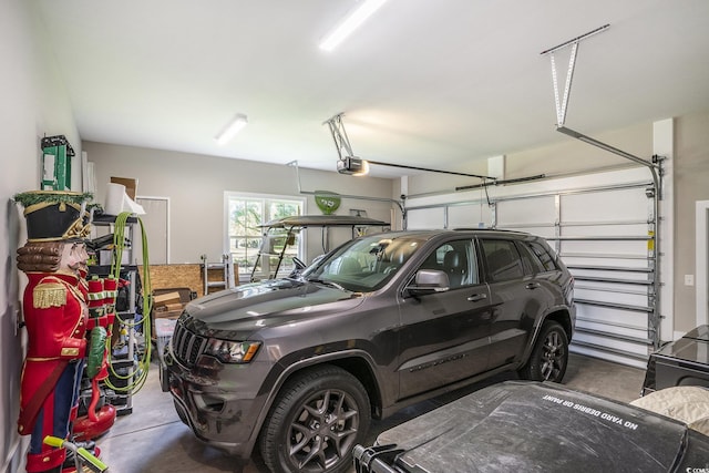 769 Country Club Dr, Pawleys Island, SC 29585 - garage featuring a garage door opener