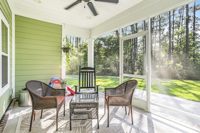 769 Country Club Dr, Pawleys Island, SC 29585 - sunroom with ceiling fan and an outdoor hangout area