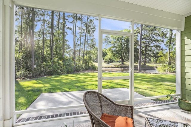 769 Country Club Dr, Pawleys Island, SC 29585 - sunroom / solarium featuring a water view, view of scattered trees, and healthy amount of natural light