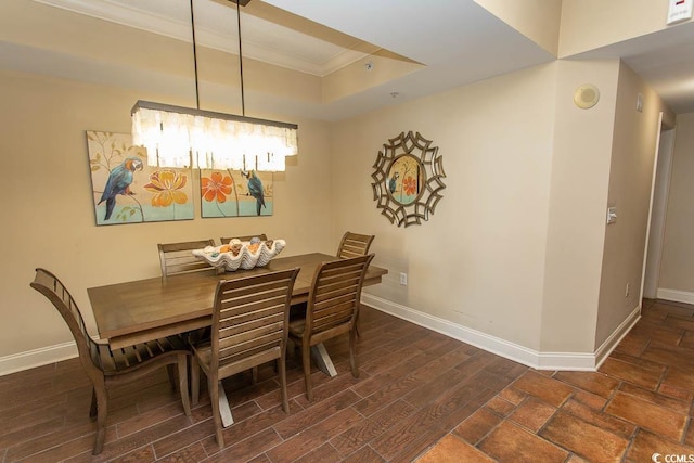 100 N Beach Blvd Unit 1511, North Myrtle Beach, SC 29582 - dining area featuring crown molding, baseboards, and a raised ceiling