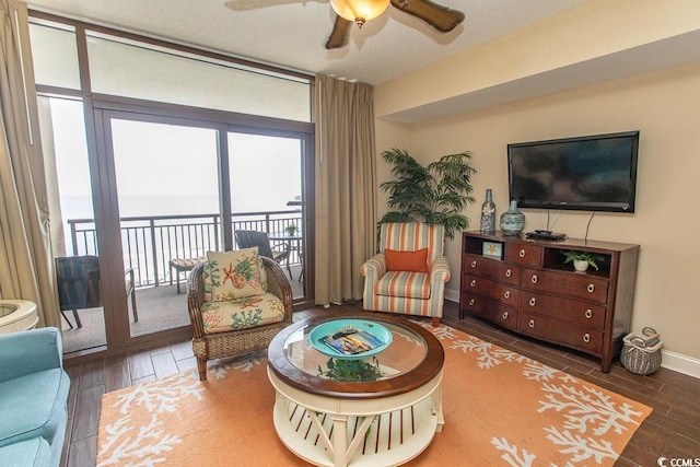 100 N Beach Blvd Unit 1511, North Myrtle Beach, SC 29582 - sitting room featuring wood finished floors, ceiling fan, and baseboards