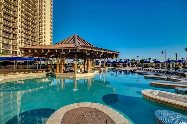 100 N Beach Blvd Unit 1511, North Myrtle Beach, SC 29582 - community pool featuring a hot tub