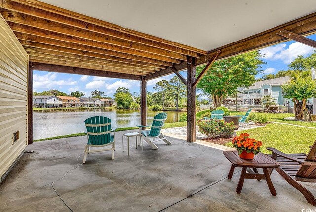 521 Bay Dr, Garden City Beach, SC 29576 - view of patio / terrace with a water view