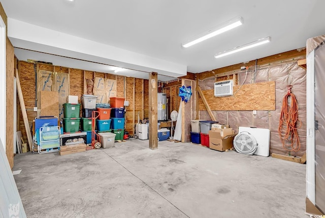 521 Bay Dr, Garden City Beach, SC 29576 - garage featuring water heater and an AC wall unit
