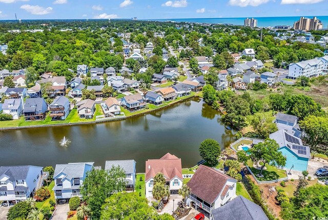 521 Bay Dr, Garden City Beach, SC 29576 - aerial view of residential area featuring a large body of water
