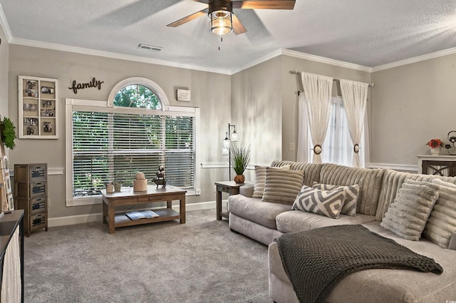 4251 Hibiscus Dr Unit 202, Little River, SC 29566 - carpeted living room featuring a ceiling fan, a textured ceiling, baseboards, and ornamental molding
