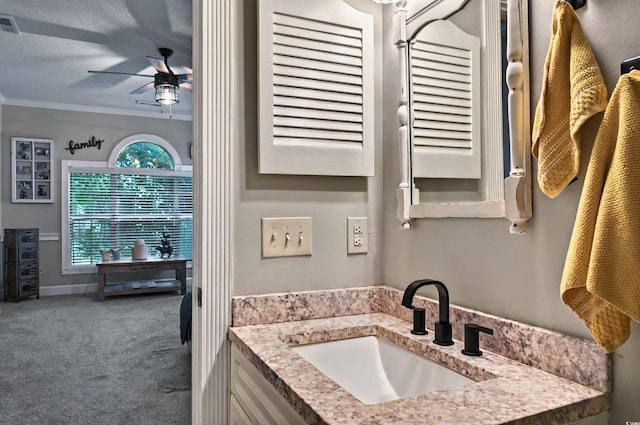4251 Hibiscus Dr Unit 202, Little River, SC 29566 - bathroom featuring vanity, ceiling fan, and ornamental molding