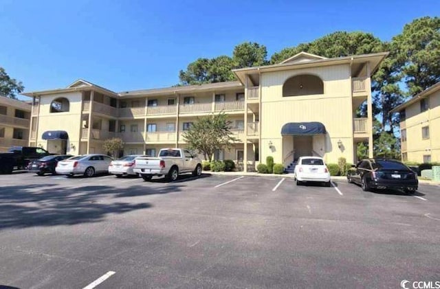 4107 Pinehurst Cir Unit Dd-15, Little River, SC 29566 - view of property featuring uncovered parking