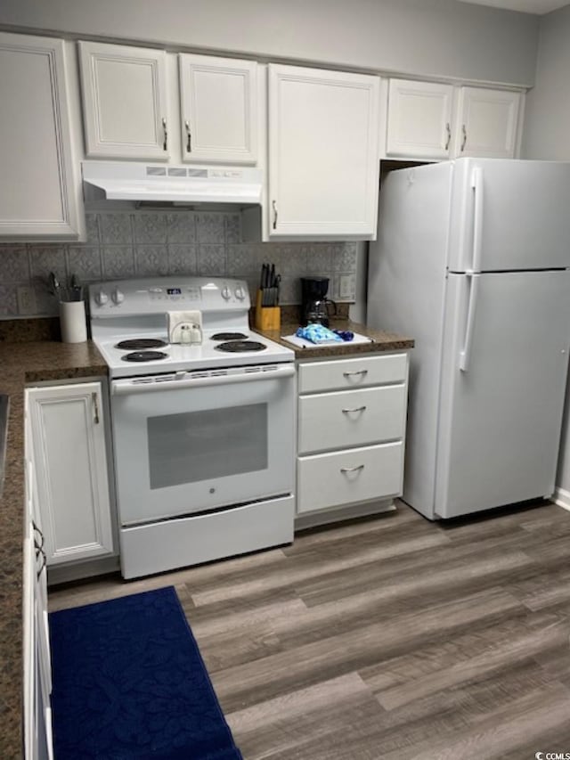 4107 Pinehurst Cir Unit Dd-15, Little River, SC 29566 - kitchen with white appliances, under cabinet range hood, white cabinets, and backsplash