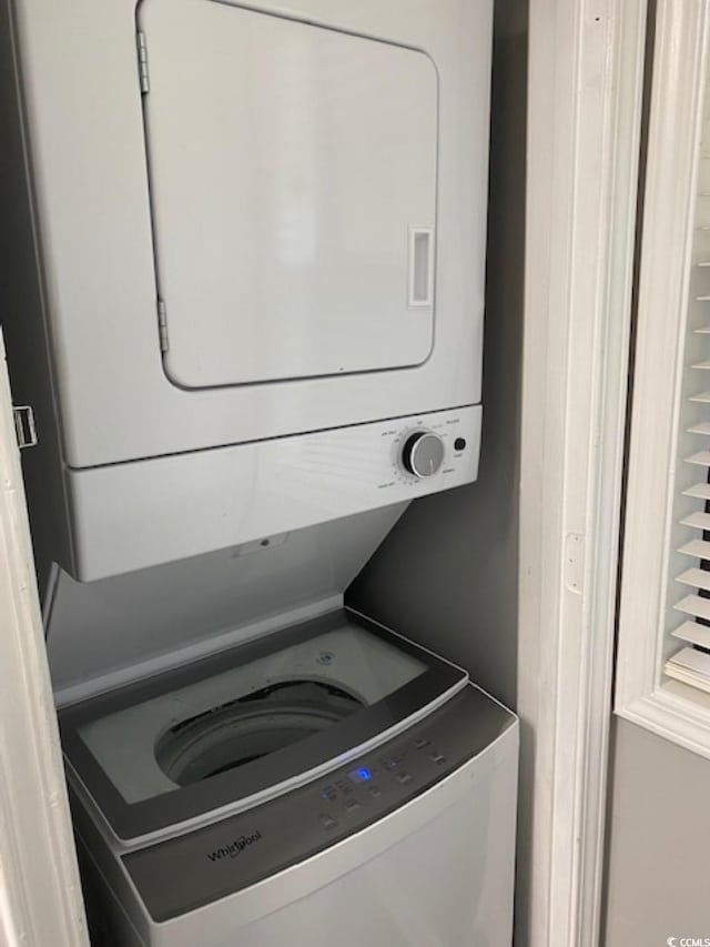 4107 Pinehurst Cir Unit Dd-15, Little River, SC 29566 - laundry area with stacked washer / drying machine