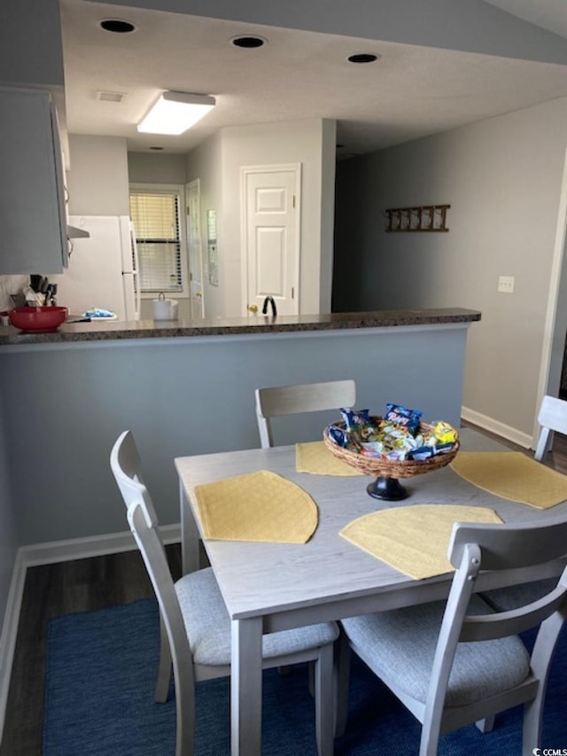 4107 Pinehurst Cir Unit Dd-15, Little River, SC 29566 - dining room with dark wood-style flooring and baseboards