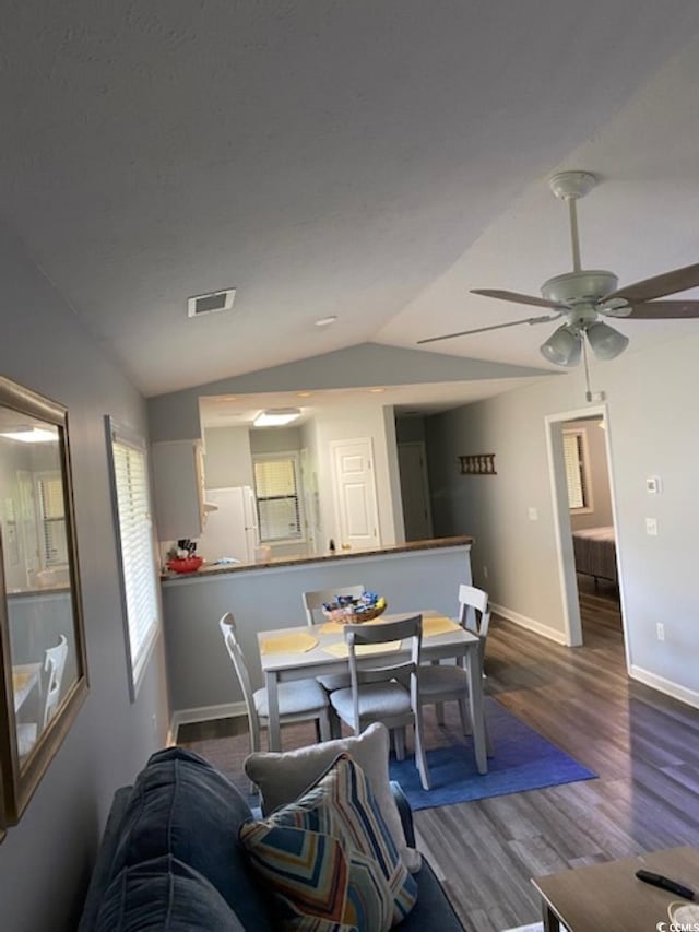 4107 Pinehurst Cir Unit Dd-15, Little River, SC 29566 - dining area with lofted ceiling, a ceiling fan, and wood finished floors