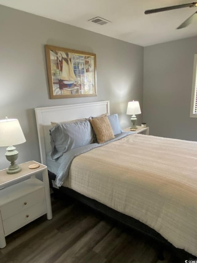 4107 Pinehurst Cir Unit Dd-15, Little River, SC 29566 - bedroom featuring wood finished floors and a ceiling fan