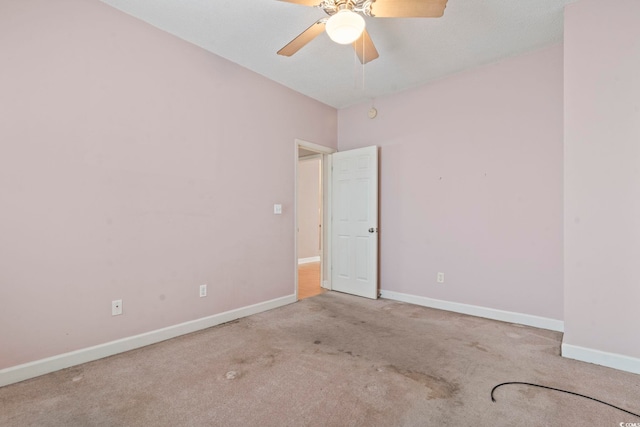 618 5th Ave S, North Myrtle Beach, SC 29582 - carpeted spare room with baseboards and a ceiling fan