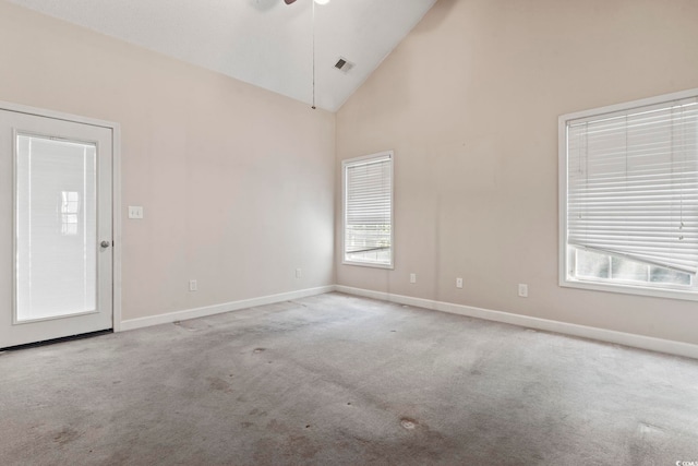 618 5th Ave S, North Myrtle Beach, SC 29582 - unfurnished room featuring carpet flooring, baseboards, ceiling fan, and high vaulted ceiling