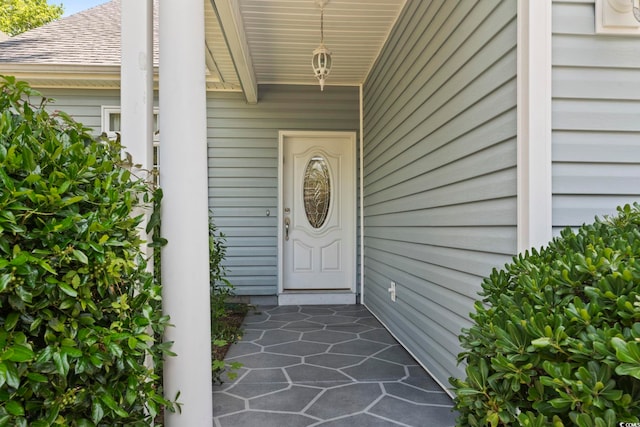 618 5th Ave S, North Myrtle Beach, SC 29582 - property entrance with roof with shingles