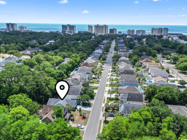 618 5th Ave S, North Myrtle Beach, SC 29582 - aerial view of residential area with a large body of water and a tree filled landscape
