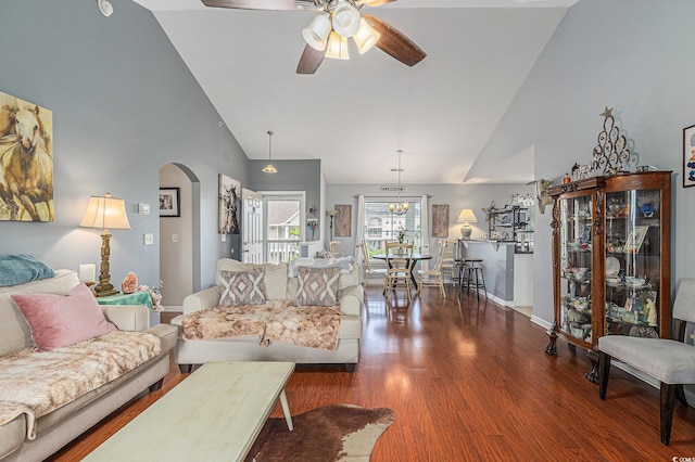 117 Butkus Dr Unit 6, Myrtle Beach, SC 29588 - living room featuring arched walkways, ceiling fan, wood finished floors, high vaulted ceiling, and baseboards