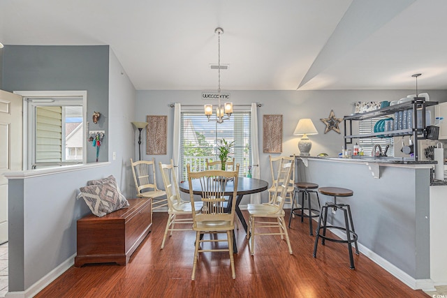 117 Butkus Dr Unit 6, Myrtle Beach, SC 29588 - dining area with wood finished floors, a chandelier, and baseboards