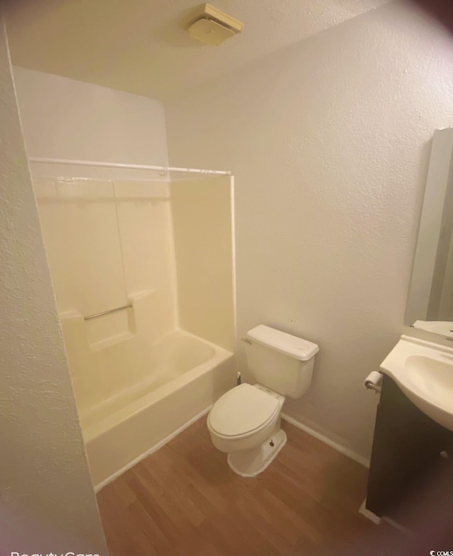 2005 Greens Blvd Unit C-204, Myrtle Beach, SC 29577 - full bath featuring wood finished floors, toilet, vanity, bathing tub / shower combination, and baseboards