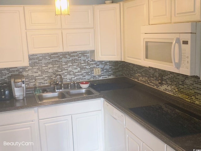 2005 Greens Blvd Unit C-204, Myrtle Beach, SC 29577 - kitchen featuring white appliances, a sink, and tasteful backsplash